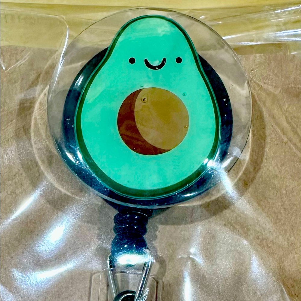 Avocado badge reel with belt clip